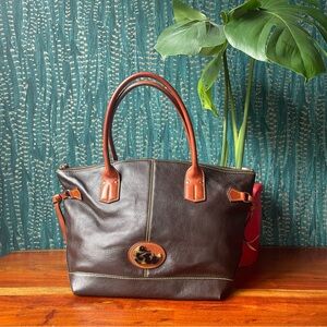 Dark Brown leather Dooney and Bourke handbag with crossbody strap.
